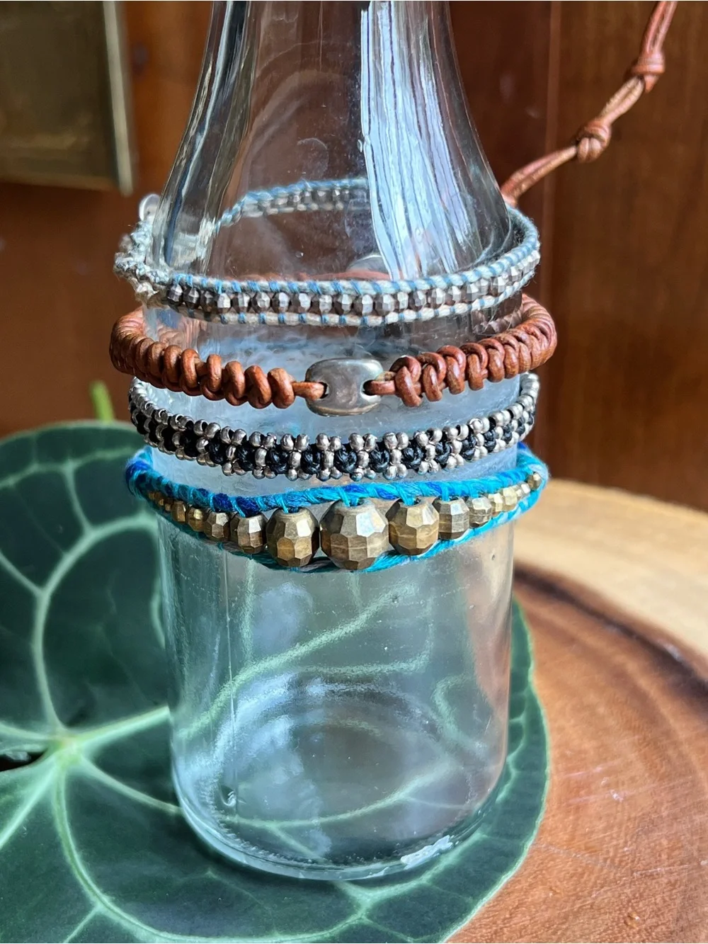 Set of Four. Stackable Beaded and Cord Bracelets - Blue, Brown, Silver, Gold